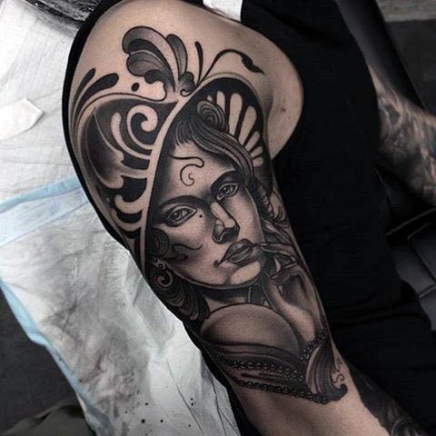 Vintage style black and white seductive woman portrait tattoo on shoulder