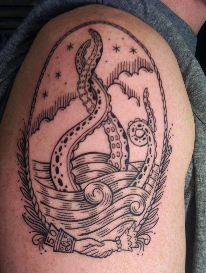 Vintage style black and white shoulder tattoo of mystical sea monster