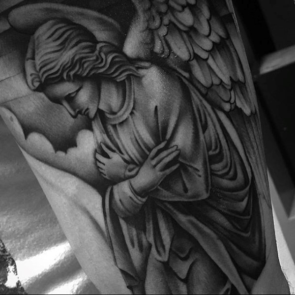 Vintage style black ink detailed tattoo of angel