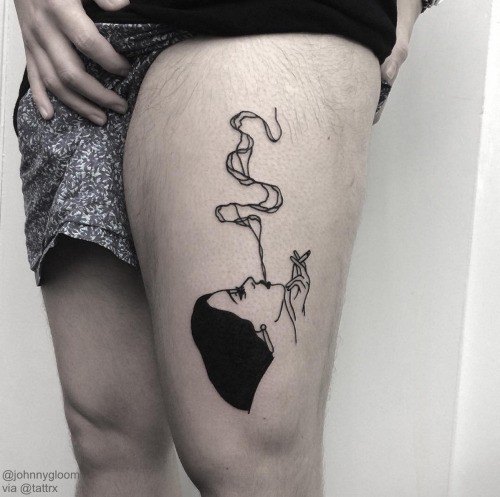 Vintage style black ink thigh tattoo of smoking woman