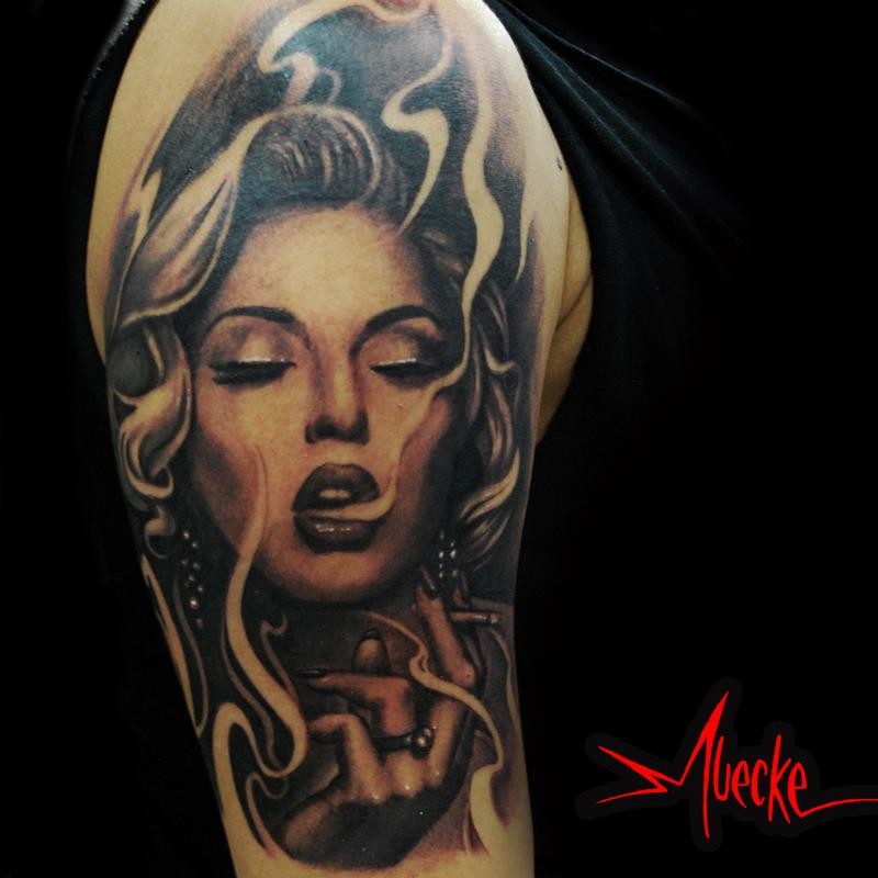 Vintage style colored shoulder tattoo of smoking sexy woman