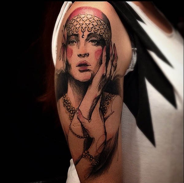 Vintage style colored shoulder tattoo of woman portrait
