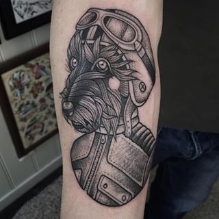 Vintage style cool painted black ink forearm tattoo of dog pilot