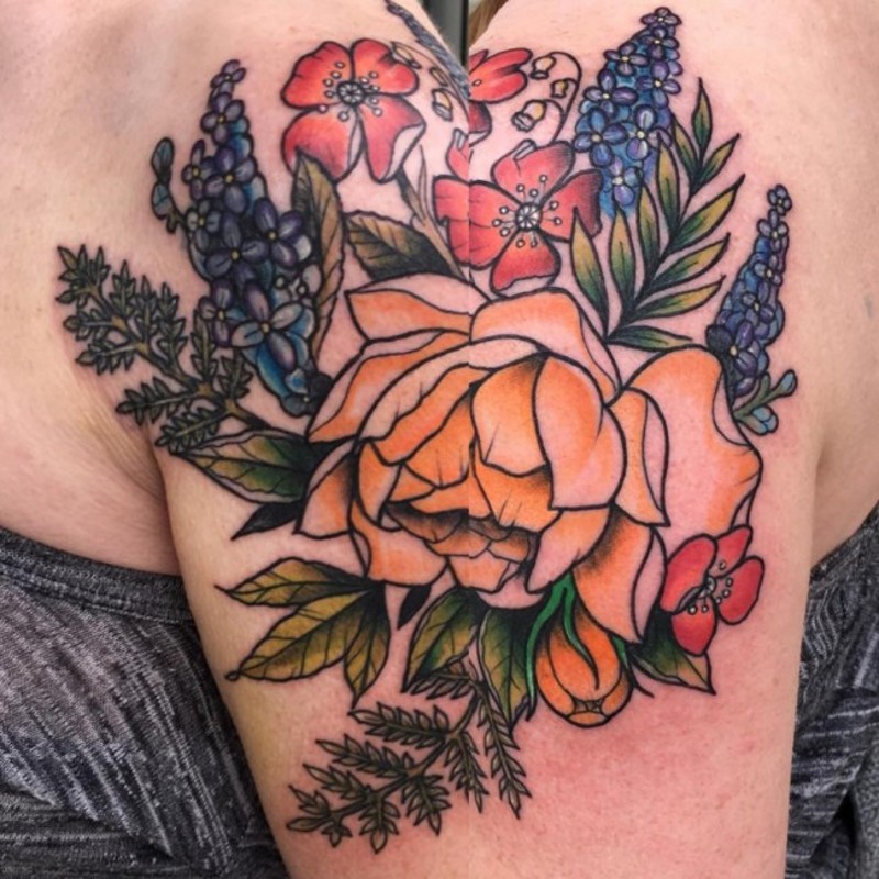 Vintage style painted and colored shoulder tattoo of various flowers