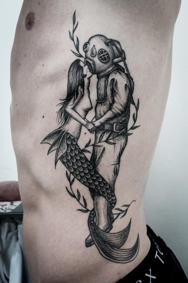 Vintage style painted black and white diver with mermaid tattoo on side