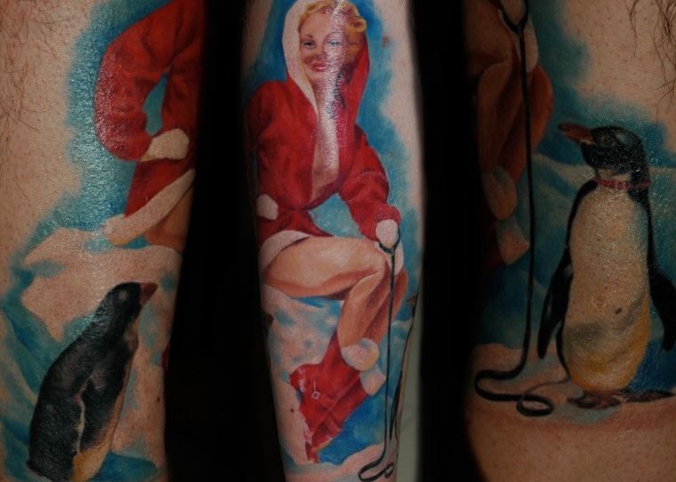 Vivid colors christmas pin up girl tattoo by Holly Azzara