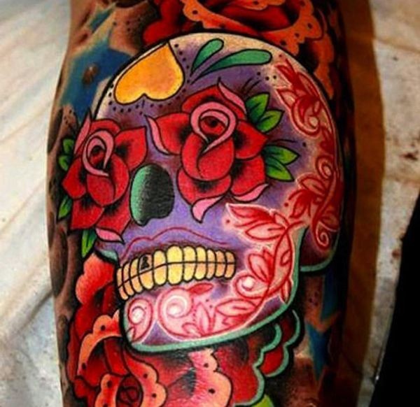 Vivid colors sugar skull with red roses tattoo