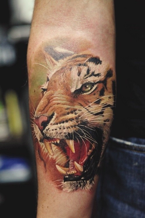 Watercolor lovely tiger head forearm tattoo