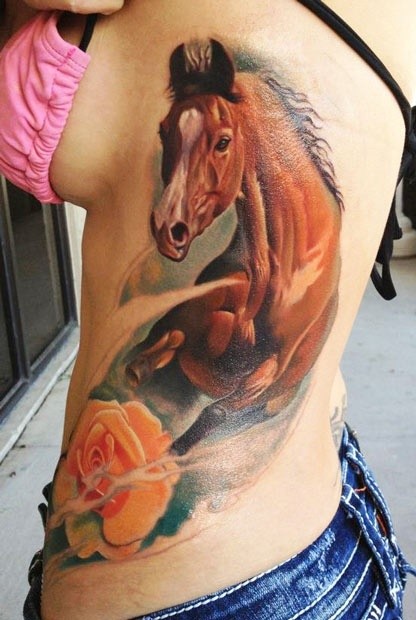 Watercolor  horse and rose tattoo on side