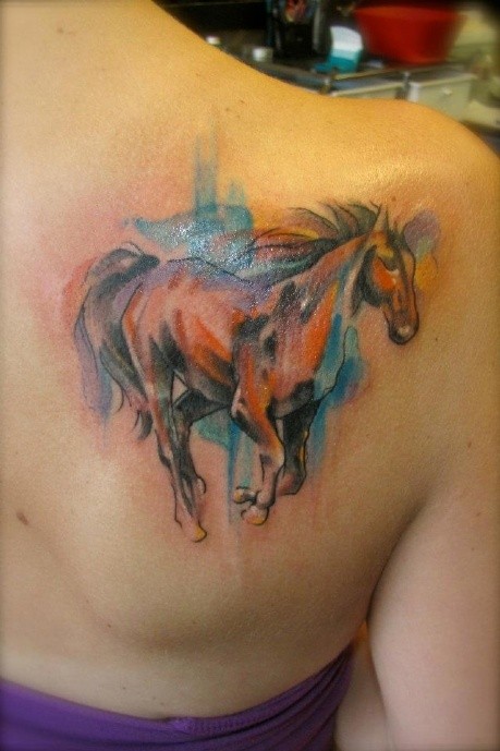 Watercolor  horse tattoo on shoulder blade
