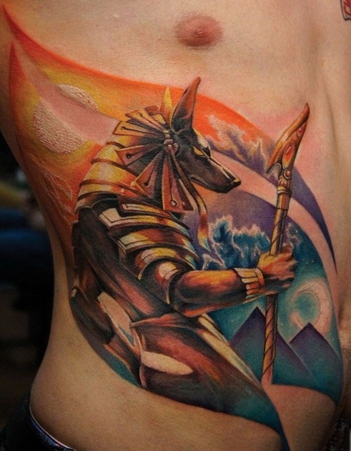Watercolor anubis tattoo on ribs