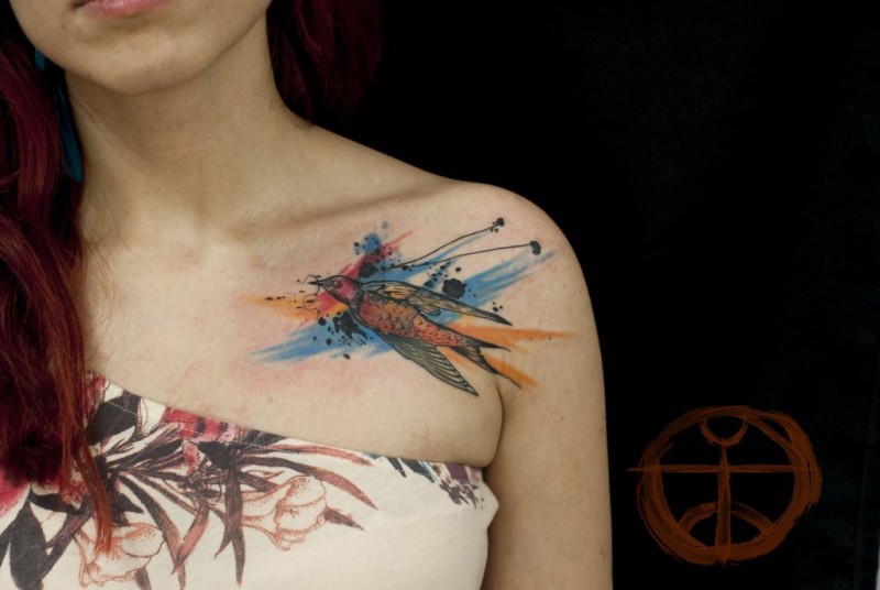 Watercolor bird tattoo on the shoulder by koraykaragozler