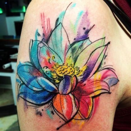 Watercolor flower tattoo on shoulder