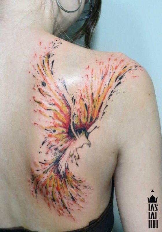 Watercolor phoenix tattoo on shoulder blade