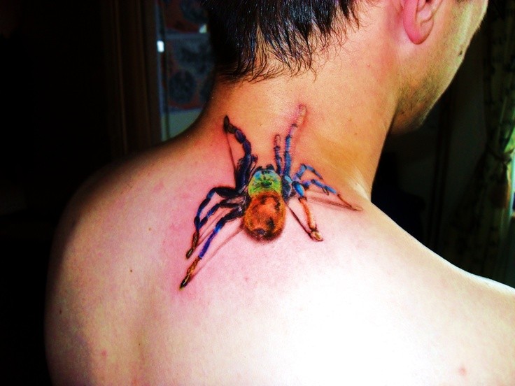 Watercolor spider tattoo on neck