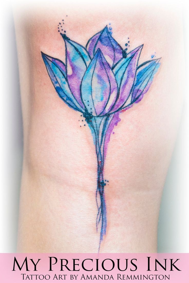 Watercolor style colored arm tattoo of beautiful flower