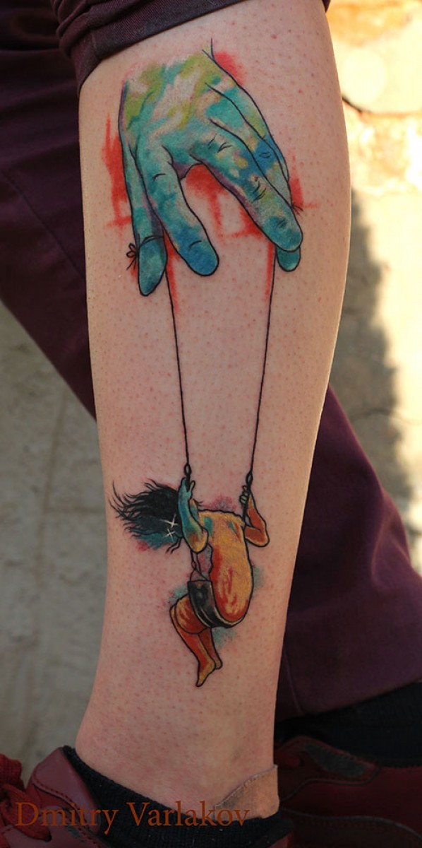 Watercolor style colored arm tattoo of human hand and girl