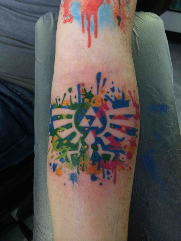 Watercolor style colored arm tattoo of interesting symbol