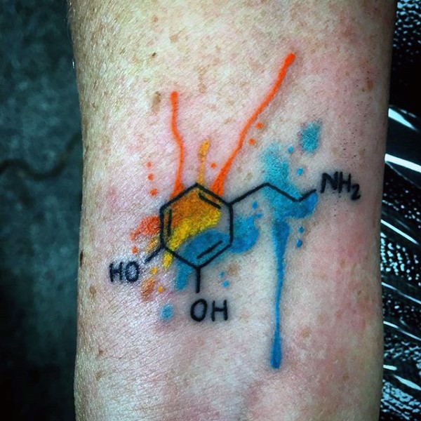 Watercolor style colored chemistry formula tattoo