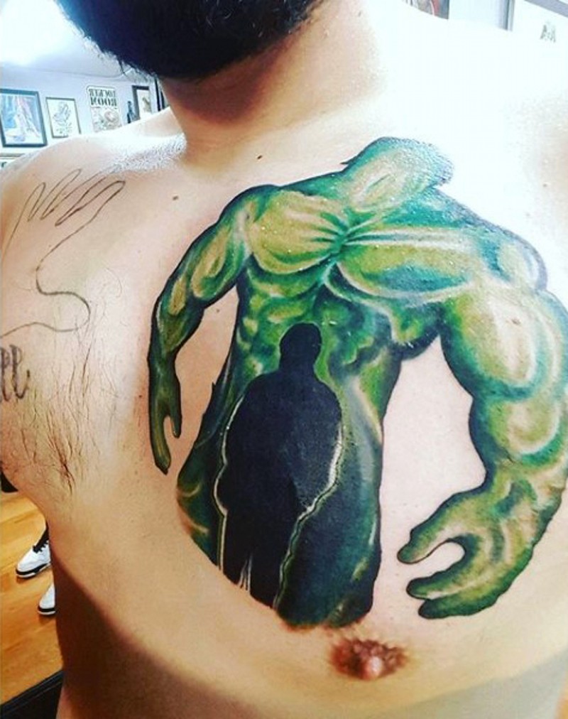 Watercolor style colored chest tattoo of Hulk and human silhouette