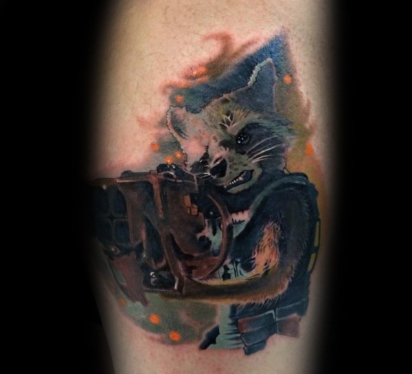 Watercolor style colored leg tattoo of movie raccoon warrior