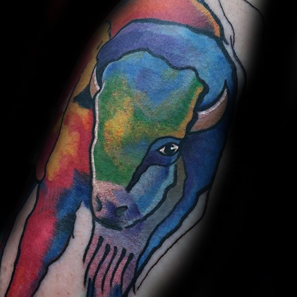 Watercolor style colored tattoo of grunting ox