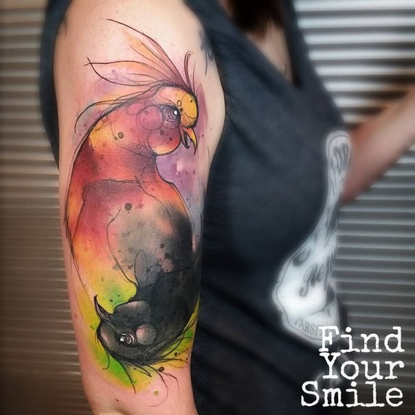 Watercolor style colorful funny birds tattoo on shoulder zone
