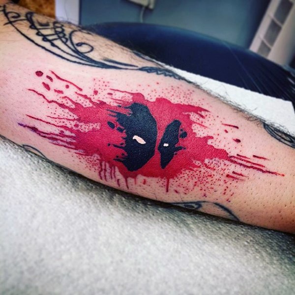 Watercolor style funny looking tattoo of Deadpool face