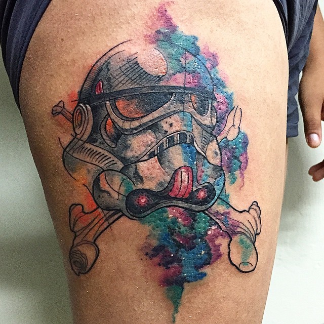 Watercolor style interesting looking thigh tattoo of storm troopers helmet with bones