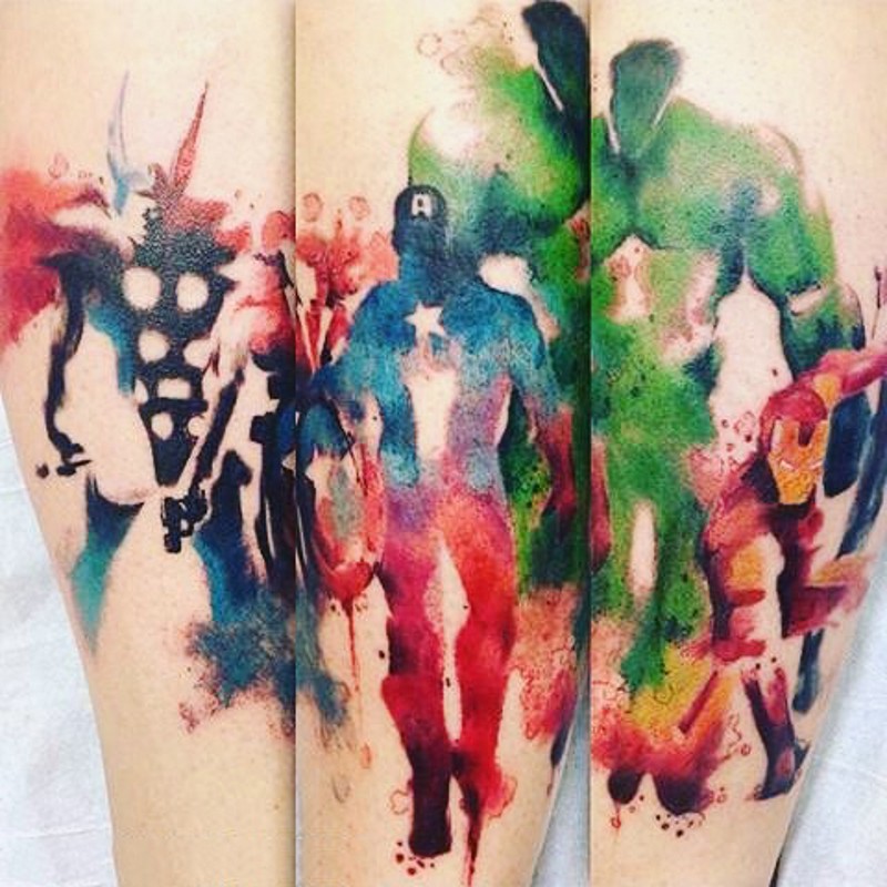 Watercolor style painted medium size forearm tattoo of various Marvel superheroes