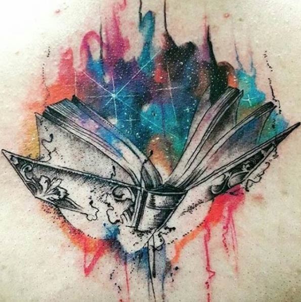 Watercolor style painted mystical magic book tattoo stylized with colorful shine