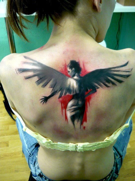 Watercolor woman with wings tattoo on back