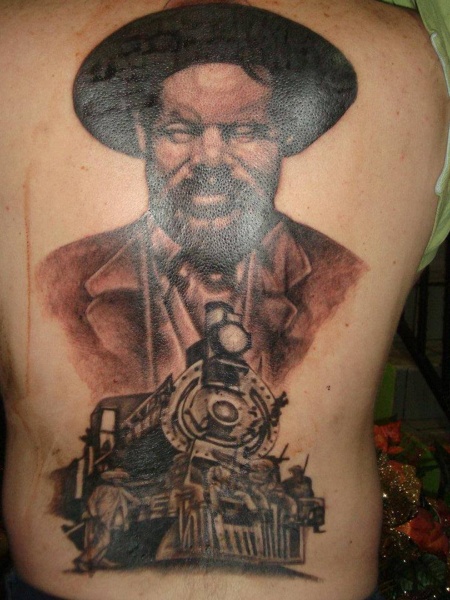 Wester style colored whole back tattoo of train and man portrait
