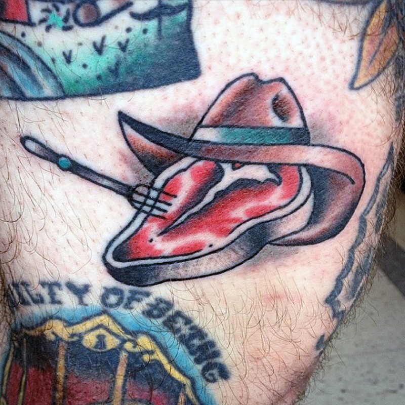 Western style colored big meat piece with hat tattoo on leg