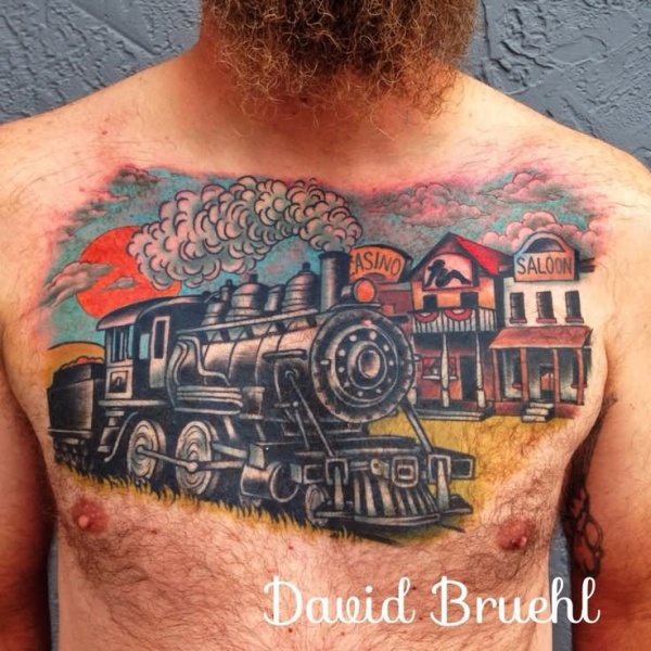 Trem estilo ocidental e casas de tatuagem no peito