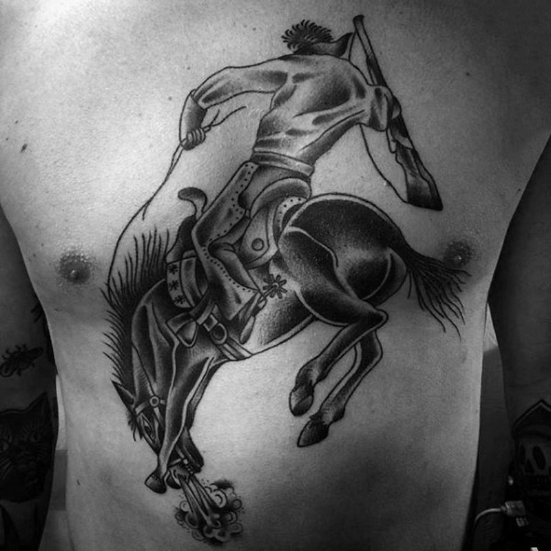 Western themed black and white cowboy with horse tattoo on