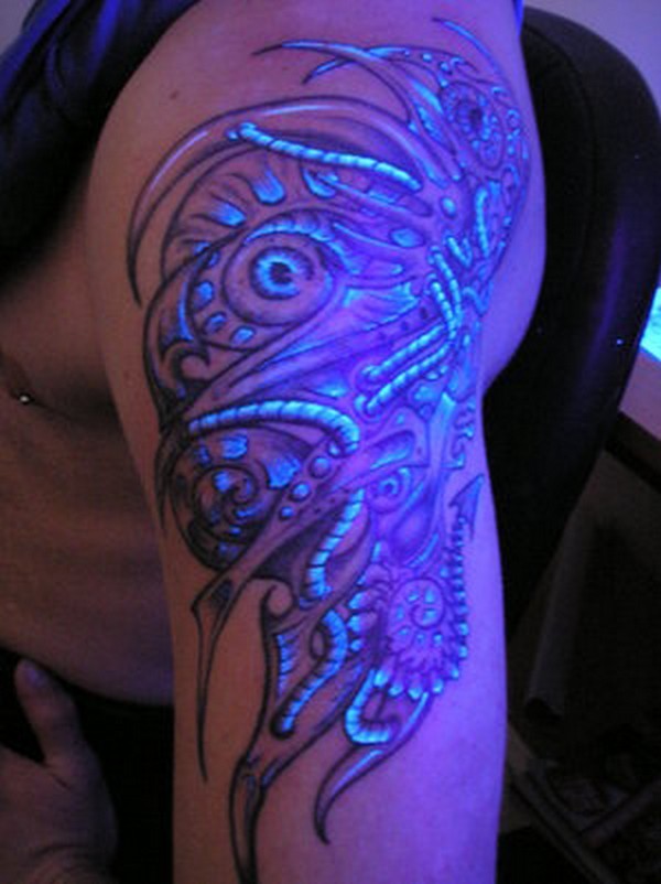 Whimsical black light abstraction tattoo on shoulder