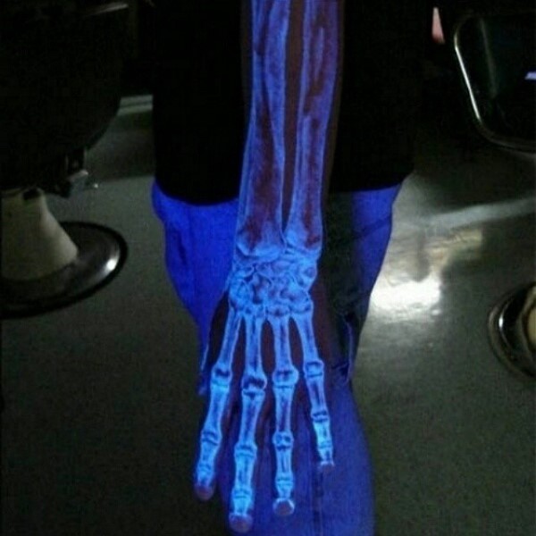 White ink luminescence hand and arm bones realistic tattoo