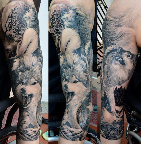 Wolf and girl tattoo on the shoulder is view