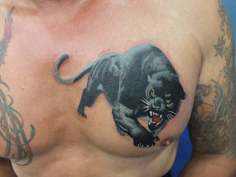 Wonderful black panther tattoo on chest