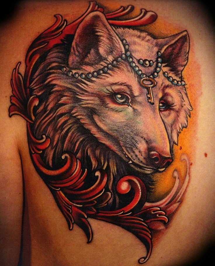 Wonderful colored accurate painted fox tattoo on back with golden key