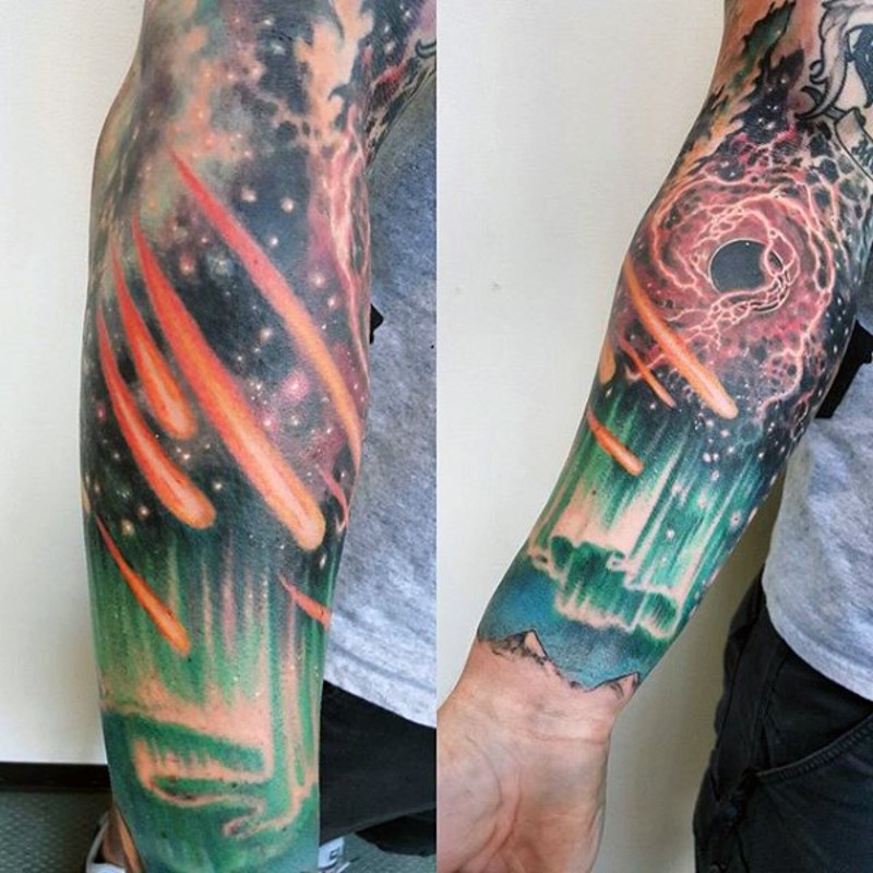 Wonderful colored deep space tattoo on sleeve