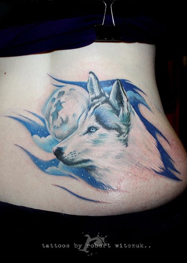Wonderful colored natural looking waist tattoo of wolf with moon