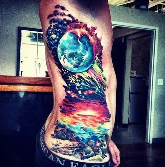 Wonderful colorful space tattoo on ribs
