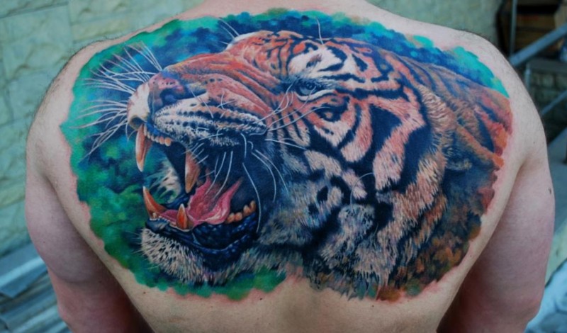 Wonderful great tiger head tattoo on back