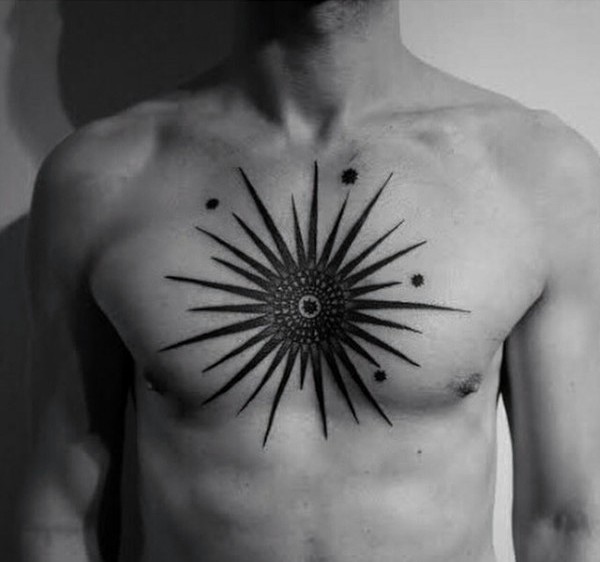 Wonderful looking black ink chest tattoo of big sun