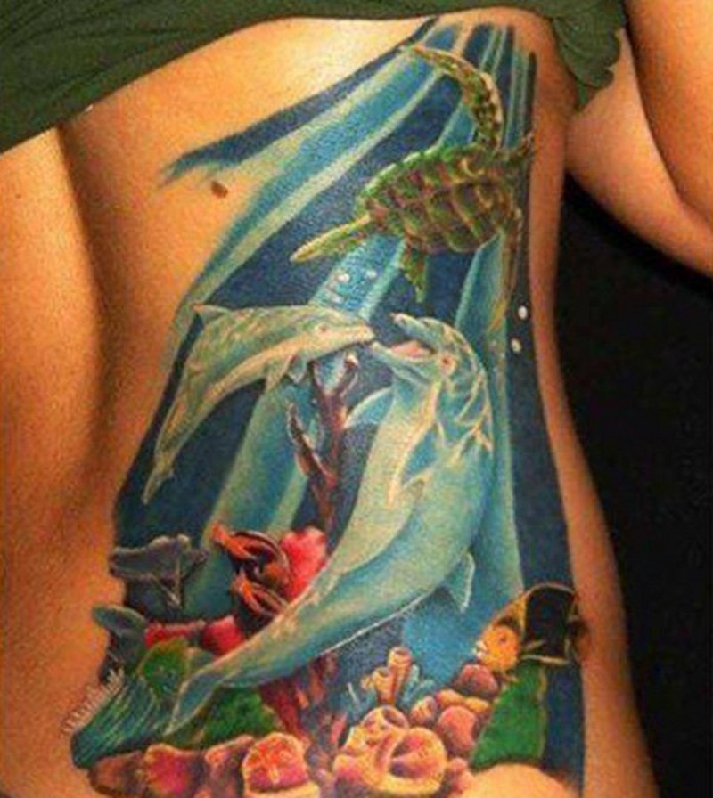 Wonderful multicolored big underwater life tattoo on back