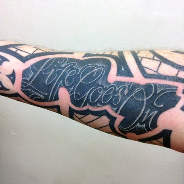 Wonderful painted black and white lettering tattoo on arm