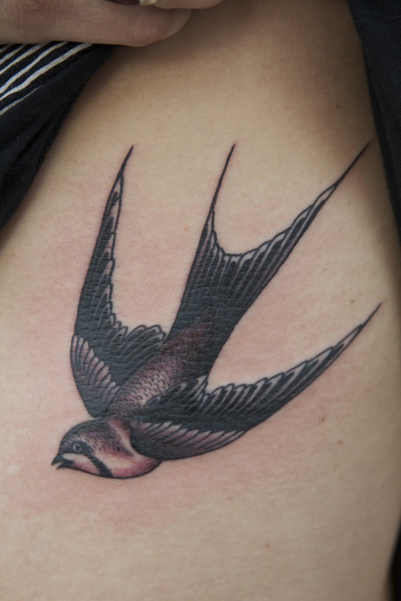 Wonderful swallow bird tattoo for lady