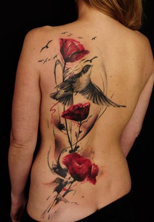 Wonderful watercolor bird and flowers tattoo on back